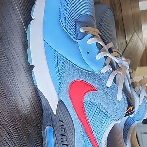 Nike University Blue Sneakers with Red Swoosh